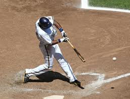 baseball player swinging